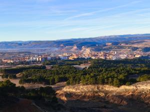 a view of a city from the top of a hill at Casa el Alfar mudéjar in Teruel