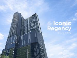 a tall building with the words iconic recovery on it at Iconic Regency by Stellar ALV in Bayan Lepas