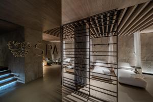 a lobby with a spa sign on the wall at Grand Hotel Duchi d'Aosta in Trieste +100 photos