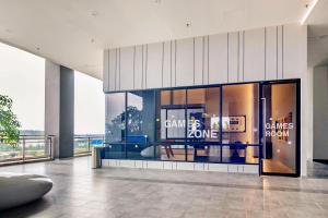 an empty lobby with a can be one sign in a building at Iconic Regency by Stellar ALV in Bayan Lepas +78 photos