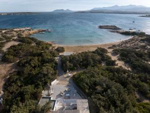 an aerial view of a beach next to the water at Beach House Mikri Santa Maria in Kournonísi