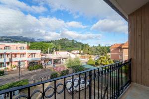 a balcony with a view of a city at Casa Malu in Marina di Campo