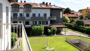 a view of a house from a balcony at Hotel Residence Aurora in Paderno Dugnano