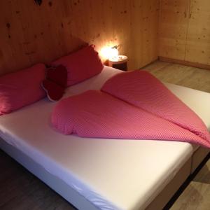 Postel nebo postele na pokoji v ubytování Apartments Resi
