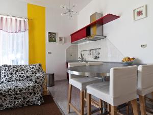 Kuchyňa alebo kuchynka v ubytovaní Kredo B&B