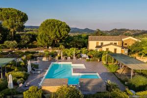 an aerial view of a house with a swimming pool at Villa Trigona in Piazza Armerina