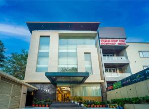 a building with stairs in front of it at HHW Hotel- Agra in Agra