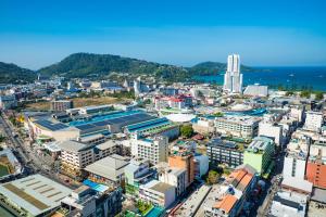 an aerial view of a city with buildings at Phuket Patong Buri Resort in Patong Beach