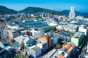 an aerial view of a city with buildings at Phuket Patong Buri Resort in Patong Beach