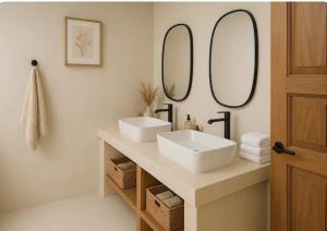 a bathroom with two sinks and mirrors on the wall at Exclusive Boho-Style 4-Bedroom Villa with Beautiful Private Tropical Pool, Spacious Outdoor BBQ & Chill-Out Terrace, Walking Distance to the Beach in Nathon Bay +26 photos