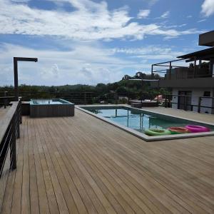 a swimming pool on the roof of a building at Villa Visgo Itacaré in Itacaré