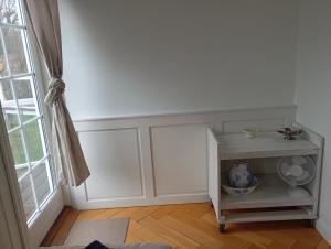 a white room with a table and a window at Stege Nor in Stege +111 photos