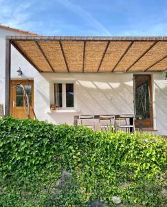 a view of a house with a fence at La maison de Juliette in Céret
