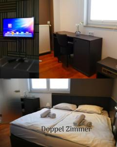 a room with a bed and a desk and a tv at Stern Hotel Hannover in Hannover