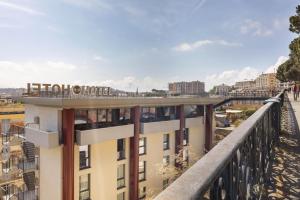a rendering of a building with a balcony at B&B Hotel Genova City Center in Genoa