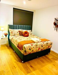 a bedroom with a bed with a pumpkin on it at Bliss in Braddon in Braddon