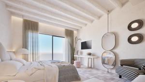 a white bedroom with a bed and a mirror at Pefkos Blue in Pefki
