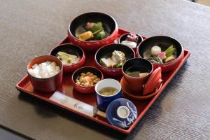 a tray of different types of food on a table at Shizuru 鴨川 ""旧SGR鴨川"" in Kyoto