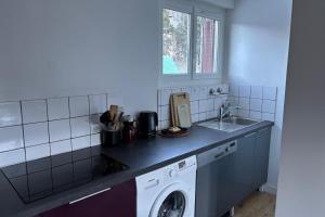 a kitchen with a sink and a washing machine at Mountain getaway in Saint-Chaffrey in Saint-Chaffrey +12 photos