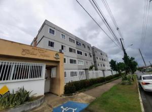 a white apartment building with a white fence at Przibilwiez Hause in João Pessoa