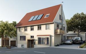 a large white house with a red roof at BLI One in Vilsbiburg