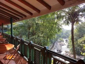 a balcony with a view of a river at Terico resort in Belihuloya +9 photos