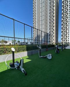 a room with exercise equipment on the roof of a building at Batu Kawan Sunset Seaview Condo near Ikea & Design Village in Batu Kawan