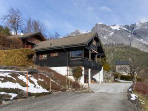 a house on the side of a snow covered mountain at Chalet Kil-Ukru by Interhome in Ovronnaz