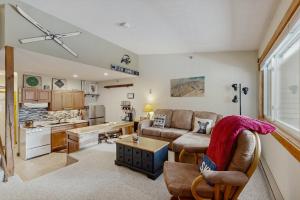 a living room with a couch and a table at Fall Line W212 in Newry