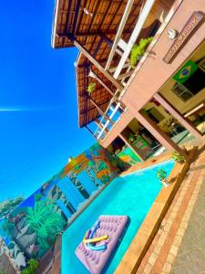 an aerial view of a resort with a pool at Hostel Park in Uberlândia