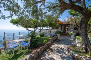 a house with a view of the ocean at Villa Gioiello in Amalfi