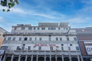 a white building with the words new royal hotel on it at Hotel New Royal Just Near Old Delhi Railway Station And Red Fort in New Delhi