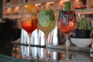 a group of three wine glasses sitting on a counter at Hayat Hotels & Apartments in Rust