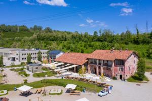 an aerial view of a building with a resort at Agronidi Baladin StarsBox in Piozzo
