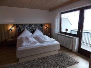 Ferienwohnung Dimpfl-Stad´l Fam. Lemberger में एक कमरे में एक या कई बेड +39 फ़ोटो