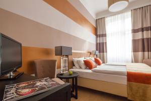 Postel nebo postele na pokoji v ubytování Hotel Elba am Kurfürstendamm - Design Chambers