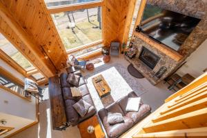 an overhead view of a living room with a fireplace at Tips Up by Railey Vacations in McHenry