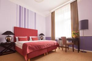 Postel nebo postele na pokoji v ubytování Hotel Elba am Kurfürstendamm - Design Chambers