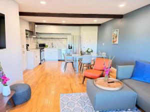 a living room with a couch and a table at Echo Lake view condo - newly renovated - centrally located in Los Angeles