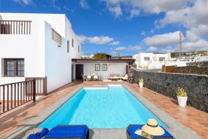 a swimming pool in the backyard of a house at Villa Europa in Nazaret