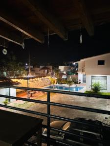 a view of a swimming pool at night at Rivadeneyra Hotel Boutique in Iguala de la Independencia