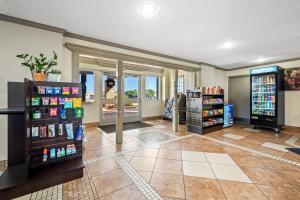a grocery store with a lot of products on display at Red Roof Inn College Station in College Station