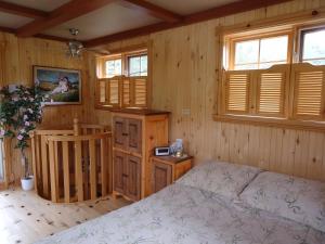 Postel nebo postele na pokoji v ubytování Chalet Saint-Thomas