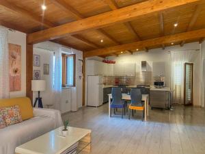 a living room with a couch and a table at Regina Claudia in Garaguso