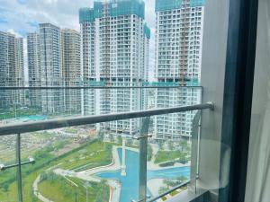 a view of a city with tall buildings at Đô thị Vinhomes Grand Park in Gò Công