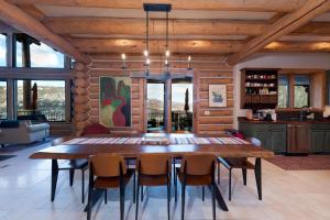 a dining room with a large wooden table and chairs at 526 Alan Rd - Durango CO. in Durango