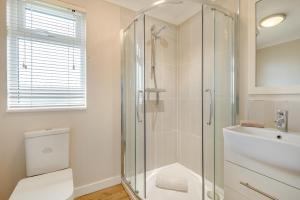 a bathroom with a shower and a toilet and a sink at 2 Bed in Evesham oc-f33689 in Admington +23 photos