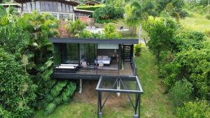 an aerial view of a house with a garden at Panorama Pueblo Tapao in Armenia