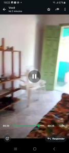 a blurry picture of a living room with a table at Casa da gamboa in Cairu