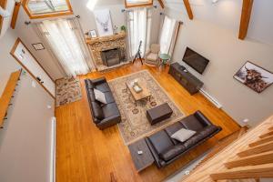 an overhead view of a living room with a fireplace at Get Your Creek On by Railey Vacations in Swanton